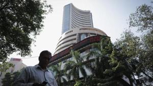 A man walks past the Bombay Stock Exchange (BSE) building in Mumbai.(Reuters File Photo) A man walks past the Bombay Stock Exchange (BSE) building in Mumbai.(Reuters File Photo)