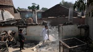 Villagers inspects the damage after their home were gutted by firing from the Pakistan side of the border in Jora farm village, in Ranbir Singh Pura district of Jammu, on Tuesday, May 22, 2018.(Nitin Kanotra / Hindustan Times) Villagers inspects the damage after their home were gutted by firing from the Pakistan side of the border in Jora farm village, in Ranbir Singh Pura district of Jammu, on Tuesday, May 22, 2018.(Nitin Kanotra / Hindustan Times)