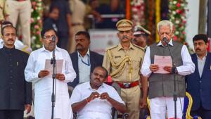 Karnataka Governor Vajubhai Vala administers the oath to Congress leader Dr G Parameshwara as Karnataka Deputy Chief Minister during the swearing-in ceremony, in Bengaluru, on Wednesday.(PTI Photo) Karnataka Governor Vajubhai Vala administers the oath to Congress leader Dr G Parameshwara as Karnataka Deputy Chief Minister during the swearing-in ceremony, in Bengaluru, on Wednesday.(PTI Photo)