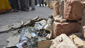 Students showed the MLA a heap of empty liquor bottles behind the school.(HT File) Students showed the MLA a heap of empty liquor bottles behind the school.(HT File)