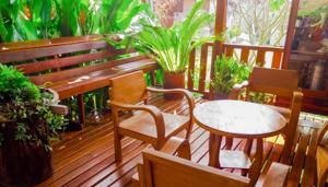 Most wood outdoor furniture will benefit from a mild scrubbing and rinsing at the start and finish of each season.(Shutterstock) Most wood outdoor furniture will benefit from a mild scrubbing and rinsing at the start and finish of each season.(Shutterstock)