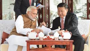 Prime Minister Narendra Modi with Chinese President Xi Jinping inside a house boat in Wuhan’s East Lake, China.(PTI File Photo) Prime Minister Narendra Modi with Chinese President Xi Jinping inside a house boat in Wuhan’s East Lake, China.(PTI File Photo)