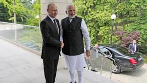 Russian President Vladimir Putin, left, and Indian Prime Minister Narendra Modi during their meeting in the Bocharov Ruchei residence in the Black Sea resort of Sochi, Russia, May 21(AP) Russian President Vladimir Putin, left, and Indian Prime Minister Narendra Modi during their meeting in the Bocharov Ruchei residence in the Black Sea resort of Sochi, Russia, May 21(AP)