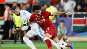 Sergio Ramos challenge on Mohammed Salah resulted in the Egyptian being substituted in the first half of Champions League final with injury.(REUTERS) Sergio Ramos challenge on Mohammed Salah resulted in the Egyptian being substituted in the first half of Champions League final with injury.(REUTERS)