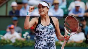French tennis player Alize Cornet celebrates during her first round match against Italy's Sara Errani at the French Open in Paris on Sunday.(Reuters) French tennis player Alize Cornet celebrates during her first round match against Italy's Sara Errani at the French Open in Paris on Sunday.(Reuters)