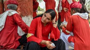 Manju Devi looks on as she shares a relaxed moment with her male colleagues, in Jaipur.(PTI) Manju Devi looks on as she shares a relaxed moment with her male colleagues, in Jaipur.(PTI)