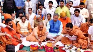 UP CM Yogi Adityanath lays the foundation stone for a state guest house in Haridwar on Monday as TS Rawat looks.(HT Photo) UP CM Yogi Adityanath lays the foundation stone for a state guest house in Haridwar on Monday as TS Rawat looks.(HT Photo)