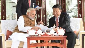 Chinese President Xi Jinping and India's Prime Minister Narendra Modi sit as they take a boat ride on the East Lake in Wuhan, China, April 28, 2018.(Reuters File Photo) Chinese President Xi Jinping and India's Prime Minister Narendra Modi sit as they take a boat ride on the East Lake in Wuhan, China, April 28, 2018.(Reuters File Photo)