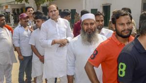BJP MLA Suresh Rana, 4th from right, waits in a queue to cast his votes for Kairana parliamentary constituency bypolls, in Shamli on Monday, May 28, 2018.(PTI) BJP MLA Suresh Rana, 4th from right, waits in a queue to cast his votes for Kairana parliamentary constituency bypolls, in Shamli on Monday, May 28, 2018.(PTI)