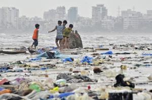 Children play amidst garbage on Juhu beach in Mumbai, on Monday, May 28.(HT PHOTO) Children play amidst garbage on Juhu beach in Mumbai, on Monday, May 28.(HT PHOTO)
