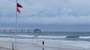 A person walks along the beach as a subtropical storm approaches Monday, May 28, 2018, in Fort Walton Beach, Florida. North Carolina’s governor is urging his state’s residents to exercise caution as rains from a subtropical depression spread into his and other Southern states.(AP Photo) A person walks along the beach as a subtropical storm approaches Monday, May 28, 2018, in Fort Walton Beach, Florida. North Carolina’s governor is urging his state’s residents to exercise caution as rains from a subtropical depression spread into his and other Southern states.(AP Photo)