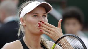 Caroline Wozniacki celebrates after defeating Spain's Georgina Garcia Perez during their French Open second round match.(AP) Caroline Wozniacki celebrates after defeating Spain's Georgina Garcia Perez during their French Open second round match.(AP)