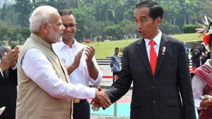 Indonesia's President Joko Widodo shakes hands with Prime Minister Narendra Modi at the National Monument in Jakarta on May 30, 2018.(AFP) Indonesia's President Joko Widodo shakes hands with Prime Minister Narendra Modi at the National Monument in Jakarta on May 30, 2018.(AFP)
