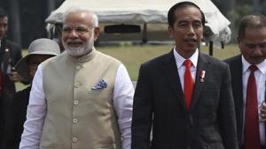 Prime Minister Narendra Modi,walks with Indonesian President Joko Widodo upon arrival at the National Monument Monas for an India-Indonesia kite exhibition in Jakarta, Indonesia, Wednesday 30, 2018.(AP) Prime Minister Narendra Modi,walks with Indonesian President Joko Widodo upon arrival at the National Monument Monas for an India-Indonesia kite exhibition in Jakarta, Indonesia, Wednesday 30, 2018.(AP)
