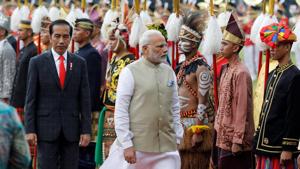 Prime Minister Narendra Modi reviews guard of honour accompanied by Indonesia President Joko Widodo at the presidential palace in Jakarta, Indonesia.(Reuters Photo) Prime Minister Narendra Modi reviews guard of honour accompanied by Indonesia President Joko Widodo at the presidential palace in Jakarta, Indonesia.(Reuters Photo)