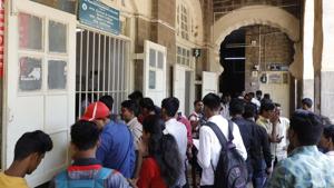 Students at the admission counter at SP College in Pune on Thursday.(Rahul Raut/HT) Students at the admission counter at SP College in Pune on Thursday.(Rahul Raut/HT)