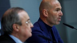 Zinedine Zidane announces his decision to step down as Real Madrid coach as club president Florentino Perez looks on in Madrid on Thursday.(REUTERS) Zinedine Zidane announces his decision to step down as Real Madrid coach as club president Florentino Perez looks on in Madrid on Thursday.(REUTERS)