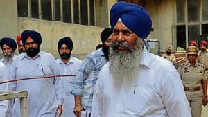 SAD’s Naib Singh Kohar walking out of the counting centre before the results were declared in Shahkot on Thursday.(Pardeep Pandit/HT) SAD’s Naib Singh Kohar walking out of the counting centre before the results were declared in Shahkot on Thursday.(Pardeep Pandit/HT)