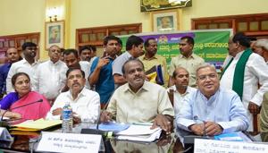 Karnataka chief minister HD Kumaraswamy, his deputy G Parameshwara and chief secretary Ratnaprabha (left) during a meeting with farmers on the issue of loan waivers, in Bengaluru.(PTI File Photo) Karnataka chief minister HD Kumaraswamy, his deputy G Parameshwara and chief secretary Ratnaprabha (left) during a meeting with farmers on the issue of loan waivers, in Bengaluru.(PTI File Photo)
