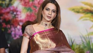 Kangana Ranaut poses for a picture during the wedding reception of Sonam Kapoor and Anand Ahuja.(AFP) Kangana Ranaut poses for a picture during the wedding reception of Sonam Kapoor and Anand Ahuja.(AFP)
