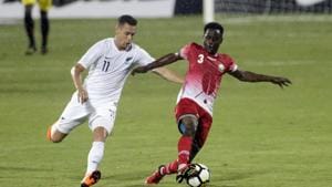 Kenya's football player Erick Ouma Otieno, right and New Zealand's Jai Emile Mau'u Ingham vie the ball during the Intercontinental Cup match.(AP) Kenya's football player Erick Ouma Otieno, right and New Zealand's Jai Emile Mau'u Ingham vie the ball during the Intercontinental Cup match.(AP)