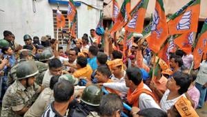 BJP leaders and activists raise slogans during a protest in Purba Bardhaman district on Friday. Close to 50 people have died in poll-related violence between April 2 and May 14, the day of polling.(PTI) BJP leaders and activists raise slogans during a protest in Purba Bardhaman district on Friday. Close to 50 people have died in poll-related violence between April 2 and May 14, the day of polling.(PTI)
