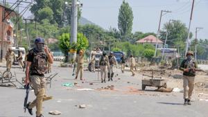 Security personnel patrol a deserted street during a curfew imposed to maintain law and order in Srinagar.(PTI Photo) Security personnel patrol a deserted street during a curfew imposed to maintain law and order in Srinagar.(PTI Photo)