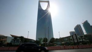 A car drives past the Kingdom Centre Tower in Riyadh, Saudi Arabia.(Reuters) A car drives past the Kingdom Centre Tower in Riyadh, Saudi Arabia.(Reuters)
