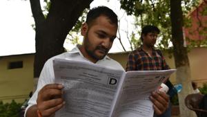 UPSC paper analysis: A student going through the general studies question paper after appearing in UPSC civil services preliminary examination first paper at school of excellence in Bhopal on Sunday.(Mujeeb Faruqui/HT Photo) UPSC paper analysis: A student going through the general studies question paper after appearing in UPSC civil services preliminary examination first paper at school of excellence in Bhopal on Sunday.(Mujeeb Faruqui/HT Photo)