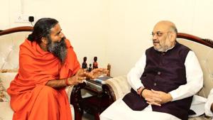 Bharatiya Janata Party president Amit Shah (right) with Yoga guru Ramdev, on Monday.(Twitter/@AmitShah) Bharatiya Janata Party president Amit Shah (right) with Yoga guru Ramdev, on Monday.(Twitter/@AmitShah)