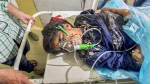 A woman injured in the Shopian grenade blast is shifted to SMHS hospital for treatment, in Srinagar.(PTI Photo) A woman injured in the Shopian grenade blast is shifted to SMHS hospital for treatment, in Srinagar.(PTI Photo)