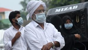 People wear safety masks as a precautionary measure after the Nipah virus outbreak, at Kozhikode Medical College in Kerala.(PTI File Photo) People wear safety masks as a precautionary measure after the Nipah virus outbreak, at Kozhikode Medical College in Kerala.(PTI File Photo)