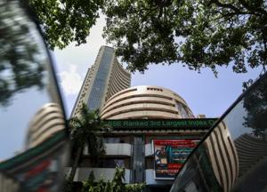 The Bombay Stock Exchange (BSE) building is pictured next to a police van in Mumbai.(Reuters File Photo) The Bombay Stock Exchange (BSE) building is pictured next to a police van in Mumbai.(Reuters File Photo)