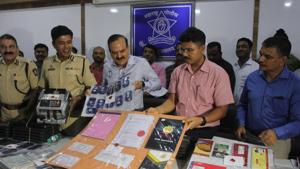 Thane crime branch officers display evidence obtained from Flinstone Group, implicated in a multi-crore scam(Praful Gangurde) Thane crime branch officers display evidence obtained from Flinstone Group, implicated in a multi-crore scam(Praful Gangurde)