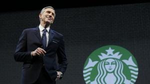Starbucks CEO Howard Schultz speaks at the coffee company's annual shareholders meeting in Seattle in March 2015. Starbucks Corp. says Schultz is stepping down as executive chairman later this month of the coffee chain he joined more than 30 years ago.(AP File Photo) Starbucks CEO Howard Schultz speaks at the coffee company's annual shareholders meeting in Seattle in March 2015. Starbucks Corp. says Schultz is stepping down as executive chairman later this month of the coffee chain he joined more than 30 years ago.(AP File Photo)