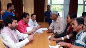 Finance minister Prakash Pant listens to problems during a public meeting at BJP office in Dehradun on Wednesday.(HT Photo) Finance minister Prakash Pant listens to problems during a public meeting at BJP office in Dehradun on Wednesday.(HT Photo)