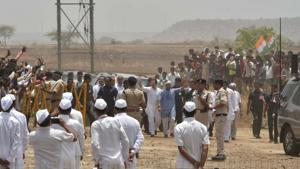 Congress leaders Rahul Gandhi and Jyotiraditya Scindia meet with people during their party’s farmers rally in Pipliya Mandi in Mandsaur district on June 06, 2018.(Mujeeb Faruqui/HT Photo) Congress leaders Rahul Gandhi and Jyotiraditya Scindia meet with people during their party’s farmers rally in Pipliya Mandi in Mandsaur district on June 06, 2018.(Mujeeb Faruqui/HT Photo)