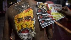 A Rajinikanth fan in Mumbai displays his tickets ahead of Kaala’s release in the city.(Kunal Patil/HT Photo) A Rajinikanth fan in Mumbai displays his tickets ahead of Kaala’s release in the city.(Kunal Patil/HT Photo)