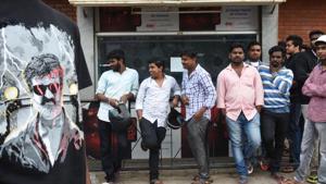 Movie goers and fans wait to buy tickets for Rajinikanth’s Kaala movie at Balaji theatre in Bengaluru on Thursday. Pro-Kannada groups staged protests outside the theatre, leading to the shows being cancelled.(Arijit Sen/HT Photo) Movie goers and fans wait to buy tickets for Rajinikanth’s Kaala movie at Balaji theatre in Bengaluru on Thursday. Pro-Kannada groups staged protests outside the theatre, leading to the shows being cancelled.(Arijit Sen/HT Photo)