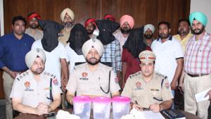 Moga police officials during a press conference on Friday.(HT Photo) Moga police officials during a press conference on Friday.(HT Photo)