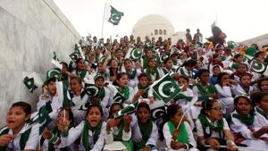Attendees wave Pakistan's national flag while singing national songs at a ceremony to celebrate the country's 70th Independence Day at the mausoleum of Muhammad Ali Jinnah in Karachi, Pakistan.(REUTERS Representative Photo) Attendees wave Pakistan's national flag while singing national songs at a ceremony to celebrate the country's 70th Independence Day at the mausoleum of Muhammad Ali Jinnah in Karachi, Pakistan.(REUTERS Representative Photo)