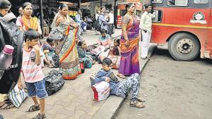 Passengers stranded at Swargate state transport bus stand in Pune. An MSRTC official said that of the expected 35,249 buses, only 10,397 were operating on Friday due to the strike.(HT PHOTO) Passengers stranded at Swargate state transport bus stand in Pune. An MSRTC official said that of the expected 35,249 buses, only 10,397 were operating on Friday due to the strike.(HT PHOTO)