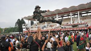 The newly commissioned officers toss a colleague up in air after the passing out parade of the gentleman cadets at IMA in Dehradun.(Vinay santosh Kumar/HT Photo) The newly commissioned officers toss a colleague up in air after the passing out parade of the gentleman cadets at IMA in Dehradun.(Vinay santosh Kumar/HT Photo)