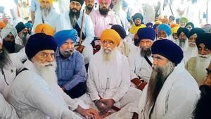 Former Akal Takht jathedar Jasvir Singh Rode (left), parallel jathedar Dhian Singh Mand (centre) and Damdami Taksal chief Harnam Singh Dhumma (right) at Bargari in Faridkot on Friday.(HT Photo) Former Akal Takht jathedar Jasvir Singh Rode (left), parallel jathedar Dhian Singh Mand (centre) and Damdami Taksal chief Harnam Singh Dhumma (right) at Bargari in Faridkot on Friday.(HT Photo)