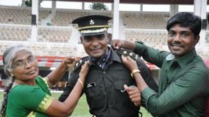 Rajshekhar with his mother and brother after the passing-out parade of the Indian Military Academy in Dehradun on Saturday.(HT/Vinay Santosh Kumar) Rajshekhar with his mother and brother after the passing-out parade of the Indian Military Academy in Dehradun on Saturday.(HT/Vinay Santosh Kumar)