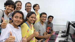 Students check their results, which were declared on Friday, for the Class 10 board exam conducted in March.(BACHCHAN KUMAR/HT PHOTO) Students check their results, which were declared on Friday, for the Class 10 board exam conducted in March.(BACHCHAN KUMAR/HT PHOTO)