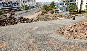 The newly constructed illegal road on Dukkar Khind hill, behind Mahatma Society on Friday.(RAHUL RAUT/HT PHOTO) The newly constructed illegal road on Dukkar Khind hill, behind Mahatma Society on Friday.(RAHUL RAUT/HT PHOTO)