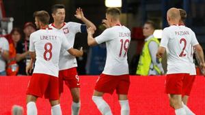 Poland captain Robert Lewandowski celebrates scoring their first goal with teammates.(REUTERS) Poland captain Robert Lewandowski celebrates scoring their first goal with teammates.(REUTERS)