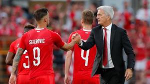 Switzerland striker Haris Seferovic shakes hands with coach Vladimir Petkovic.(REUTERS) Switzerland striker Haris Seferovic shakes hands with coach Vladimir Petkovic.(REUTERS)
