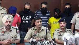 Mohali SSP Kuldeep Singh Chahal producing the five gangsters before mediapersons in Mohali.(HT Photo) Mohali SSP Kuldeep Singh Chahal producing the five gangsters before mediapersons in Mohali.(HT Photo)